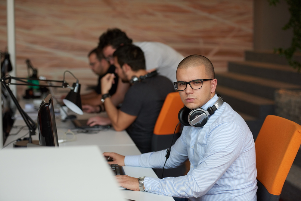 startup business, software developer working on computer at modern office-1